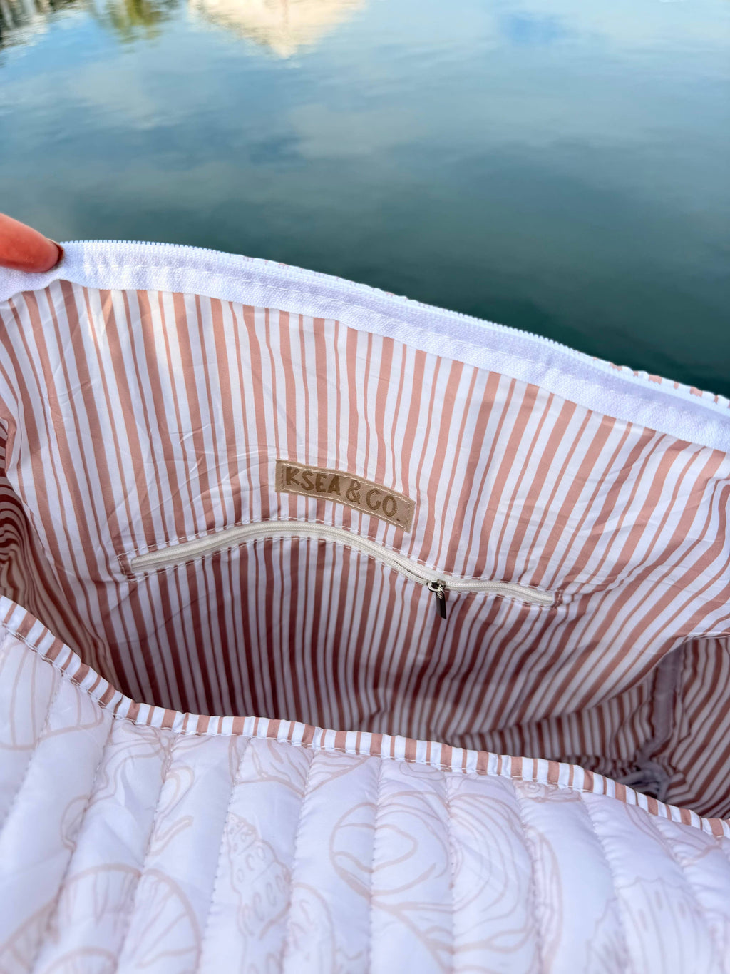 Ivory Tides Quilted Duffle Bags