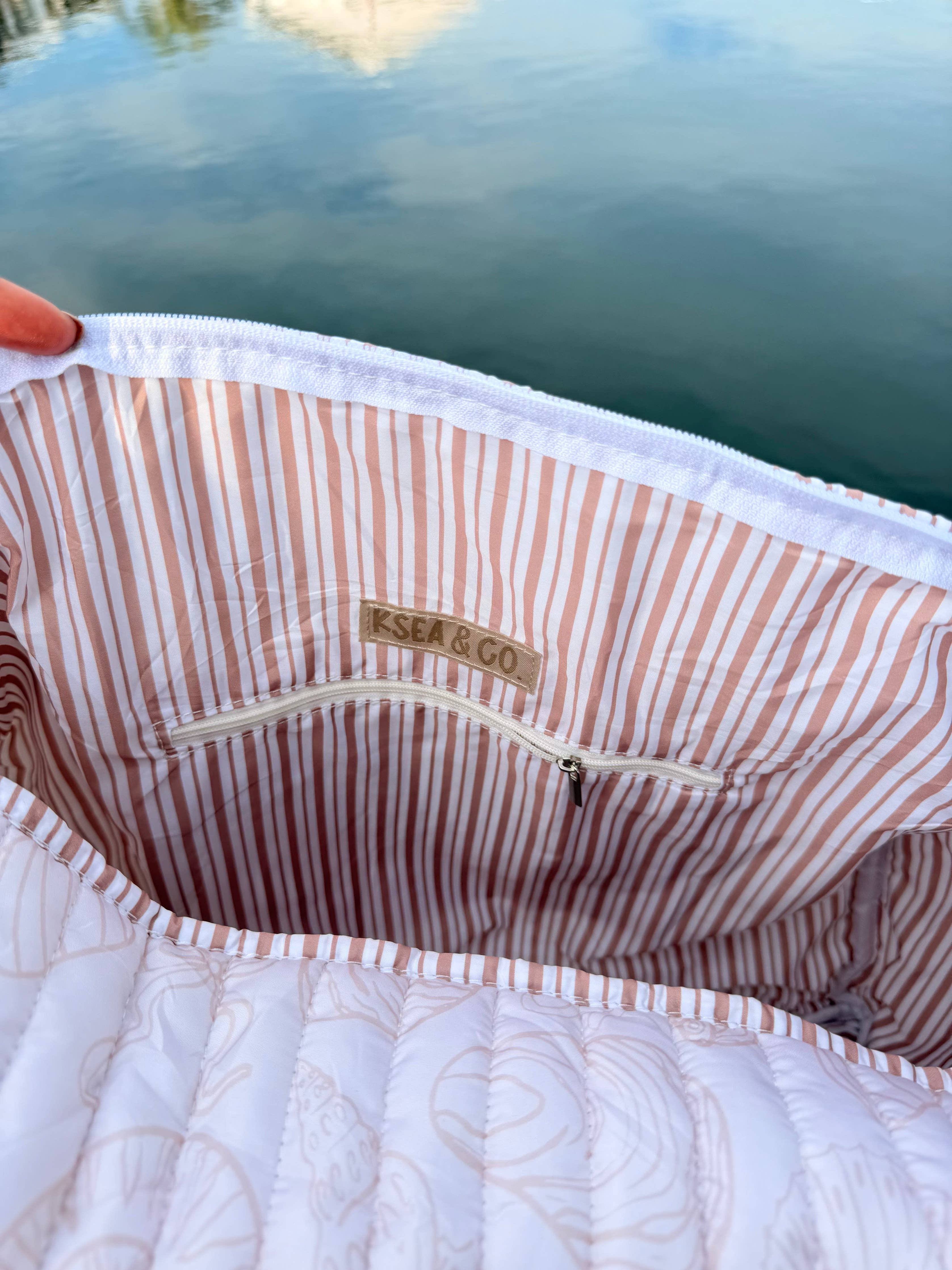 Ivory Tides Quilted Duffle Bags