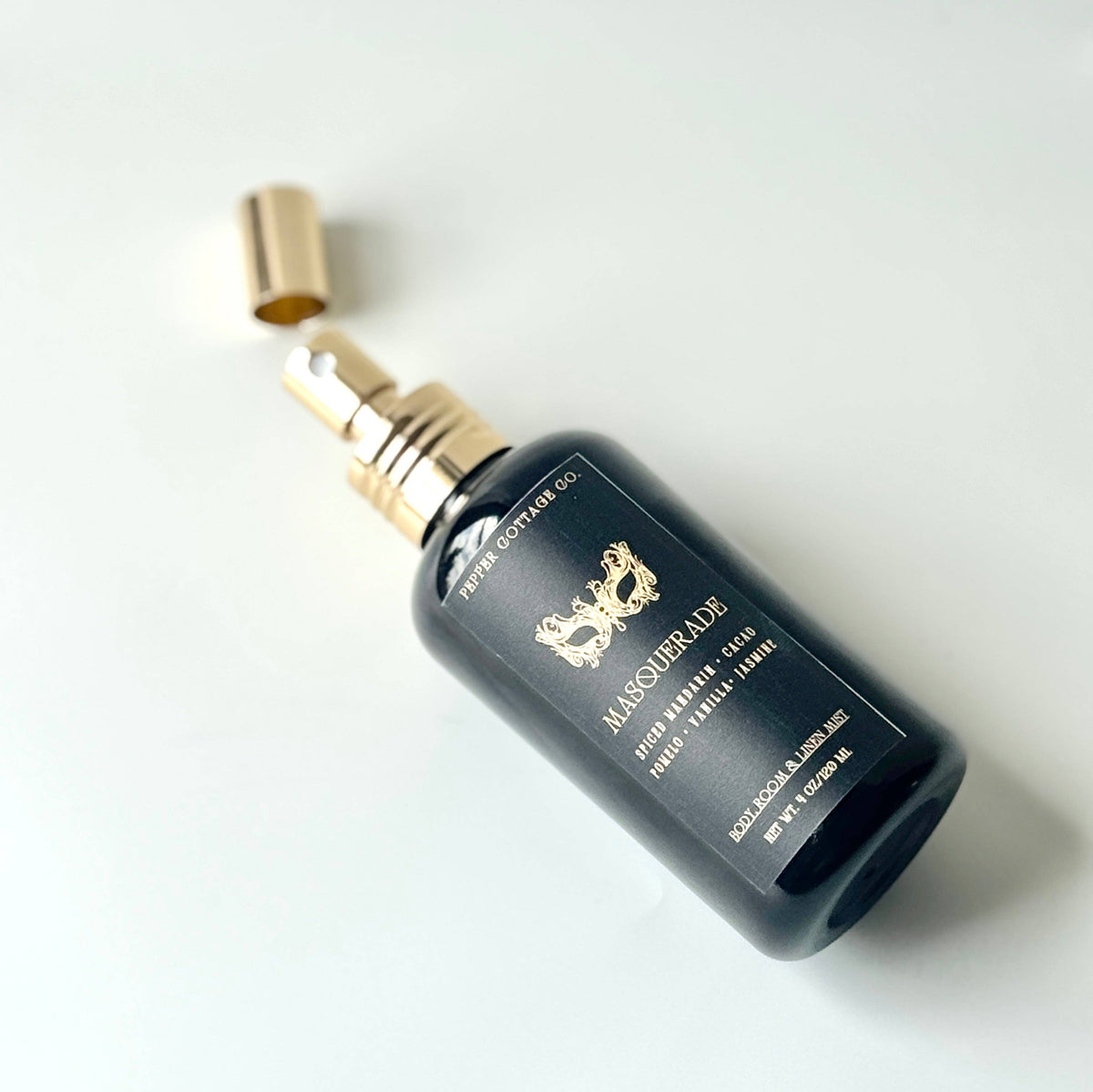 Masquerade 4 oz Body + Home Mist | Spiced Mandarin, Cacao, Pomelo, Vanilla, Jasmine | Spicy Citrus Floral Dark Academia-Inspired Body Mist