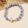 BLUE CERAMIC PORCELAIN CROSS CHARM BRACELET | 40B5175