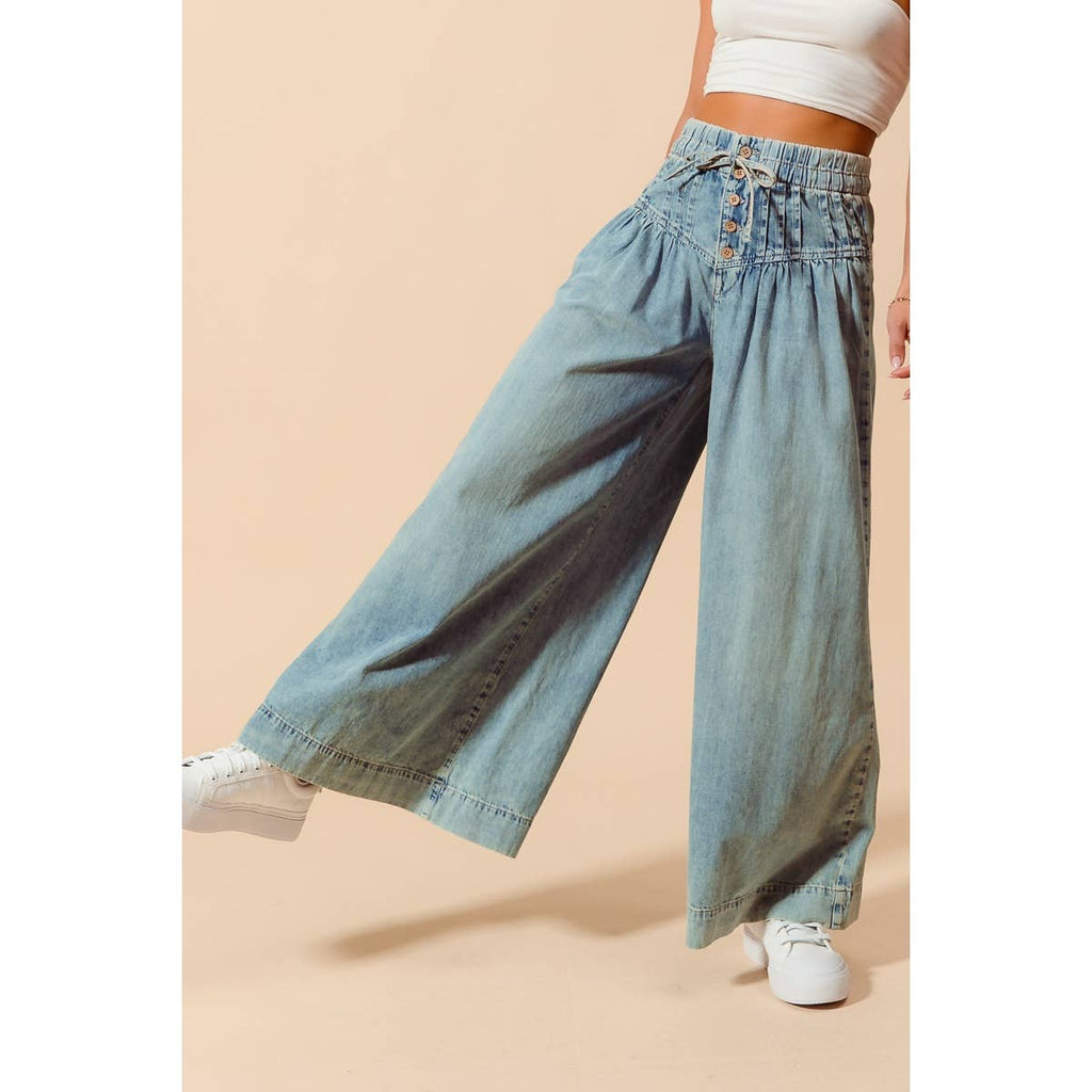 WIDE LEG JEANS WITH BUTTON CLOSURE WITH DRAWSTRING