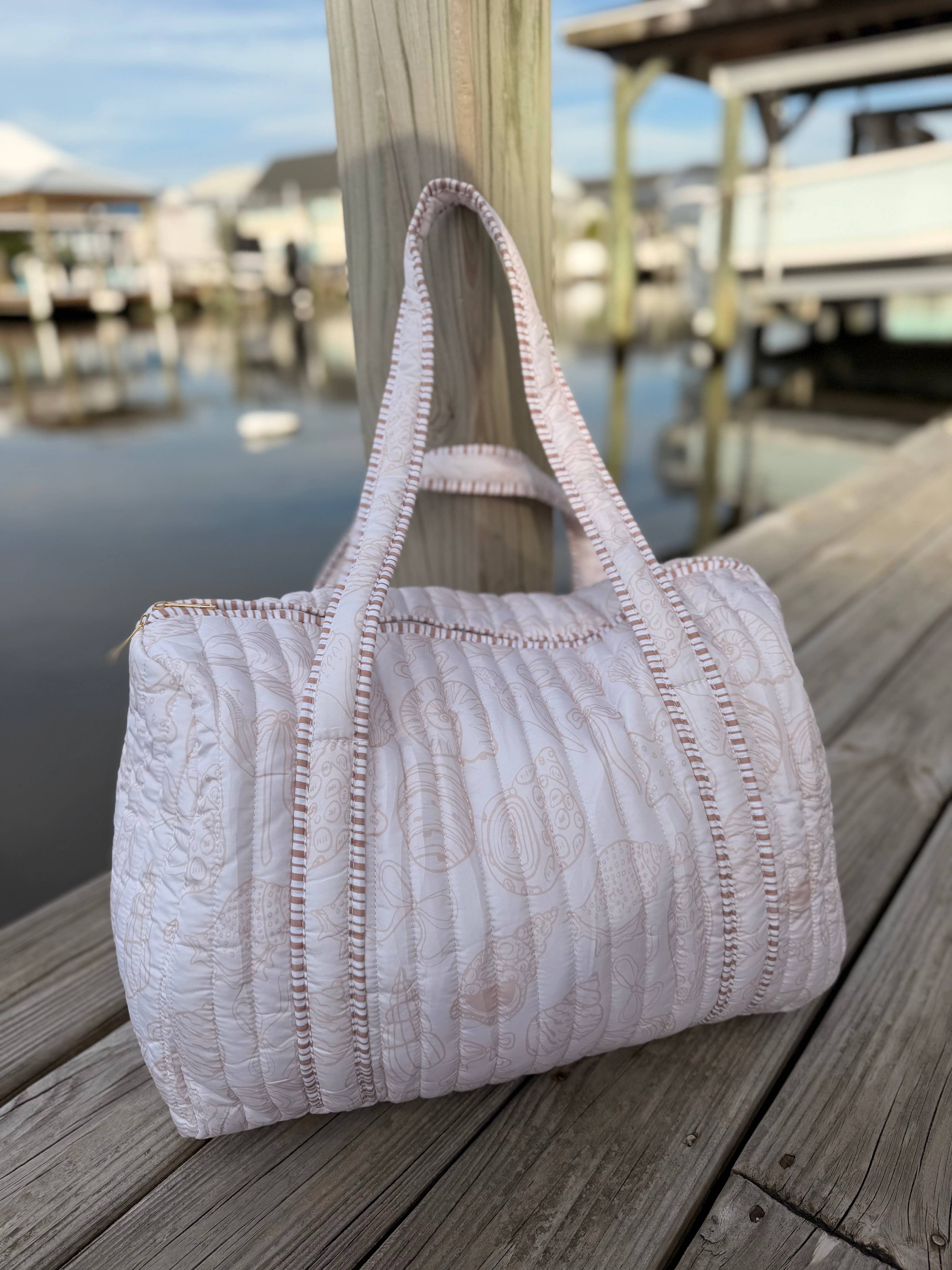 Ivory Tides Quilted Duffle Bags