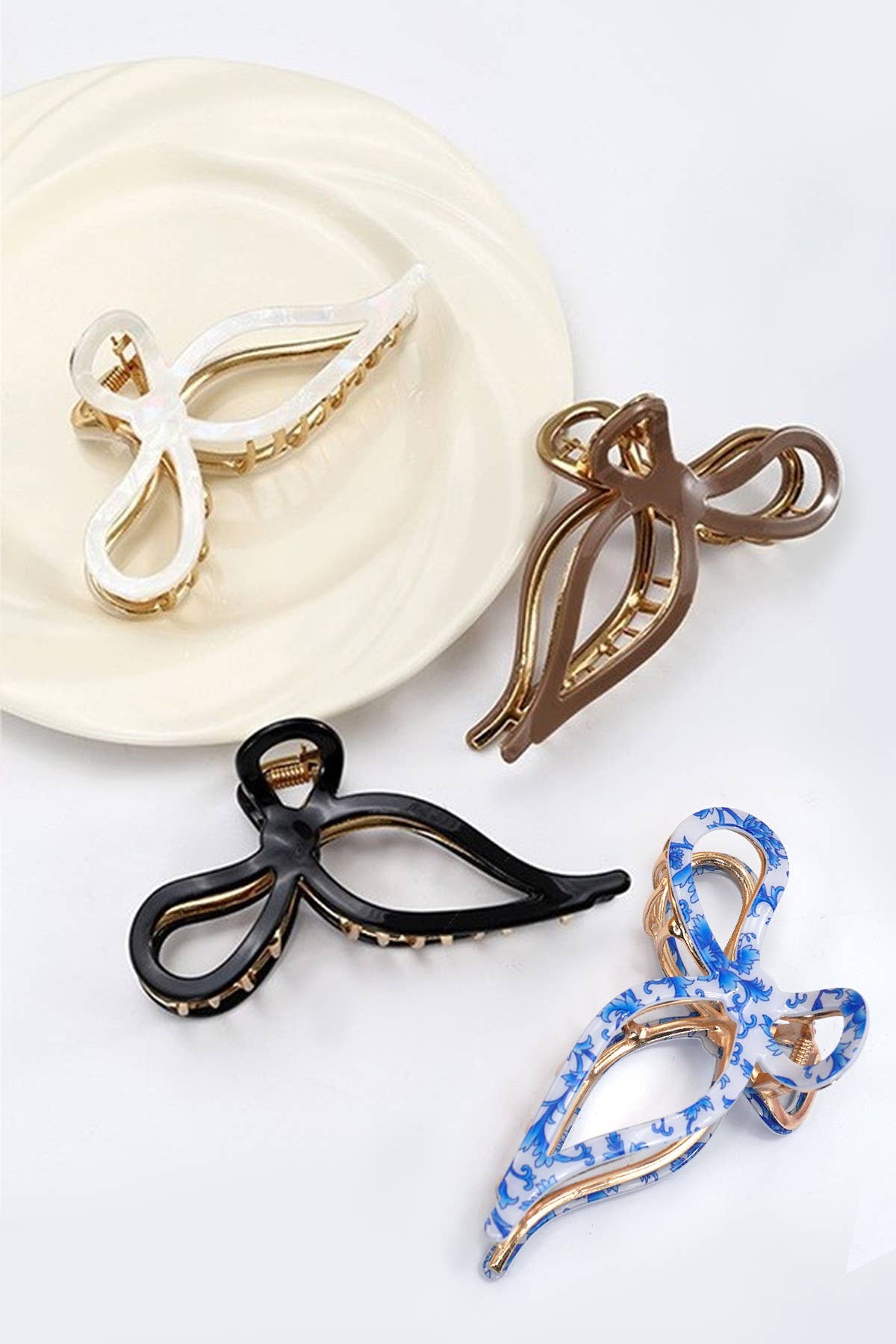 JUMBO CELLULOSE CASTING BOW HAIR CLAW CLIPS | 40H759